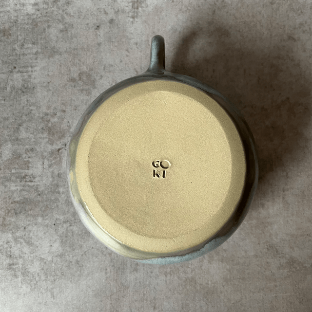 La tasse irisée arrondie 